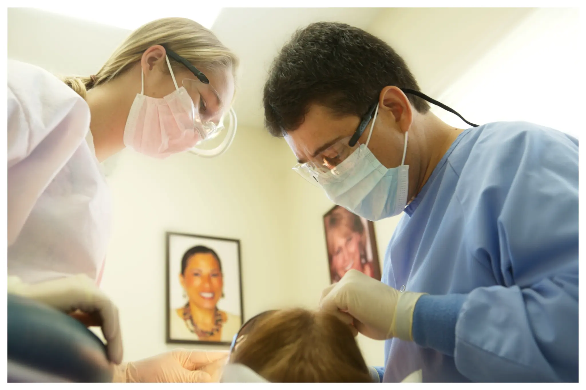 Dr. Rene Aviles and clinical assistant providing focused patient care in the operatory